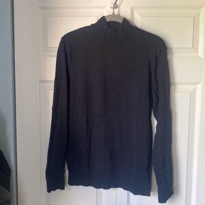 Large black turtleneck
